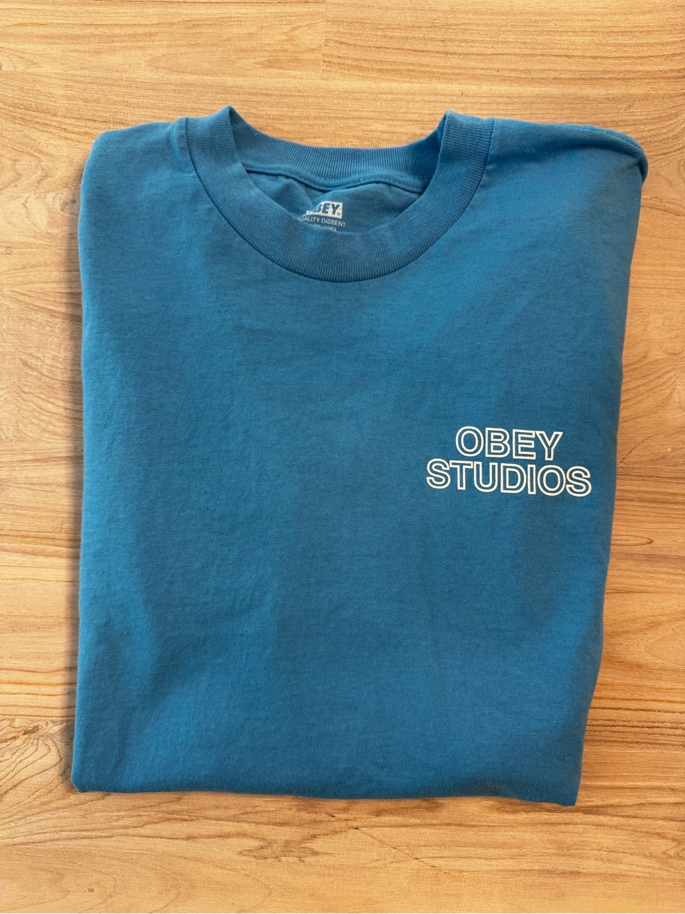 Obey Teal Short Sleeve Crewneck Tee with 'Obey Studios' Chest Logo